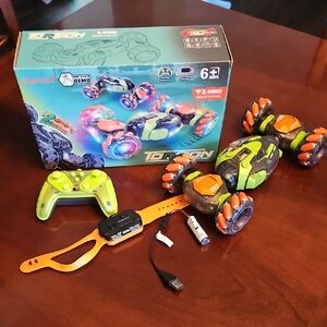 Green and Orange Remote Control Stunt Car